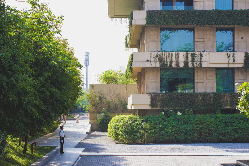 2K, urban, asphalt, building, apartment building, nature, building exterior, india, security, city, street, tarmac, sky, person, growth, hotel, neighborhood