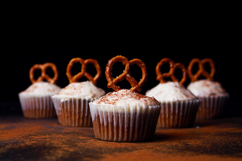 glazed food, cupcake holder, icing, pretzels, focus on foreground, cake, close up, cupcakes, no people, group of objects, temptation, freshness, muffin