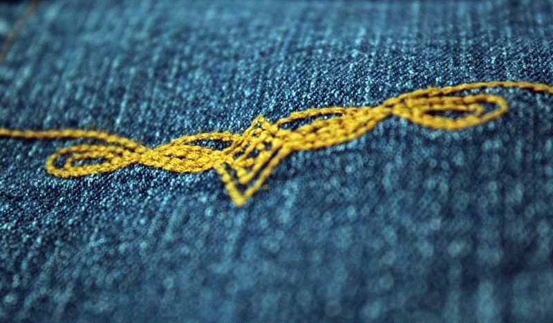 softness, embroidered denim, clothing, macro, backgrounds, blue, rough, denim, art and craft, thread, jeans, pattern, yellow, textile, extreme close-up