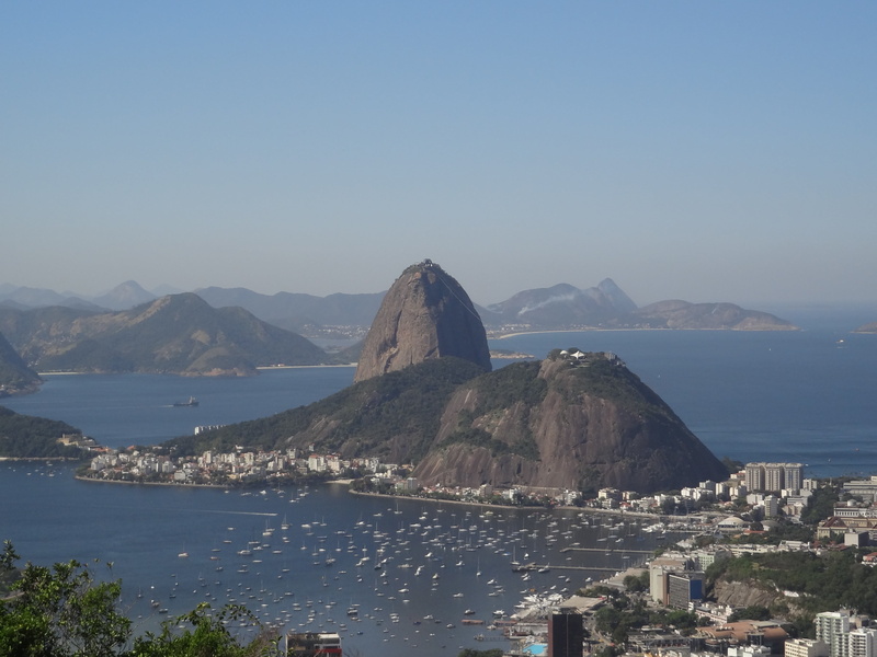 sea, copy space, beauty in nature, water, sugar loaf, mountain range, building exterior, outdoors, bay, clear sky, mountains, day, cityscape, nature, city