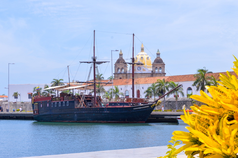 boat, belief, sky, place of worship, canal, sailboat, nature, transportation, building exterior, nautical vessel, day, cartagena, water, travel destinations