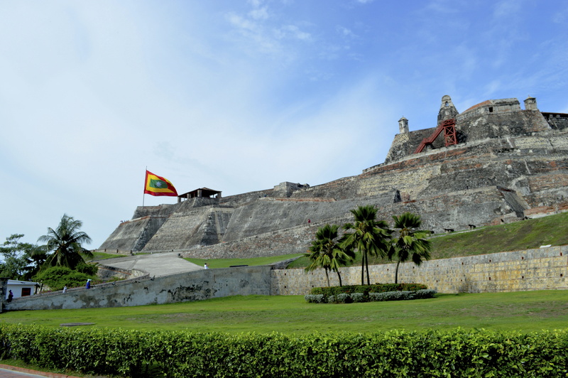 castle of san felipe, colombia, low angle view, patriotism, the past, architecture, flag, building exterior, cartagena, day, plant, tree, no people, history