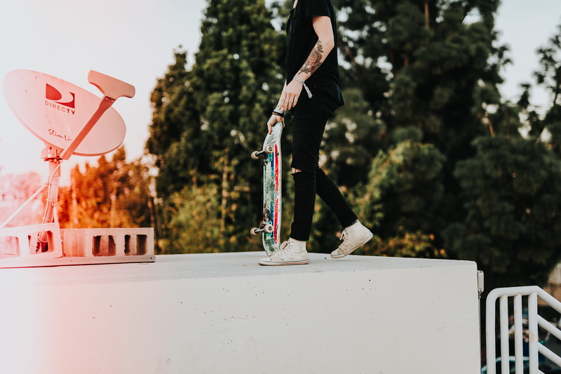 representation, leisure activity, real people, man, lifestyles, jumping, sign, tree, stunt, nature, standing, sport, plant, surface, person, casual clothing