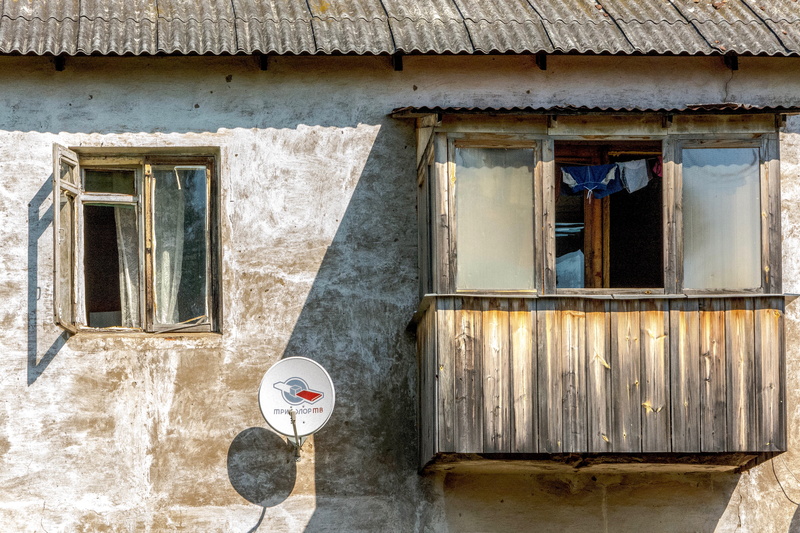 sunlight, shelter, farmhouse, building exterior, door, satellite dish, home, antenna, technology, balcony, wooden, nature, rural, window, parabolic, wall