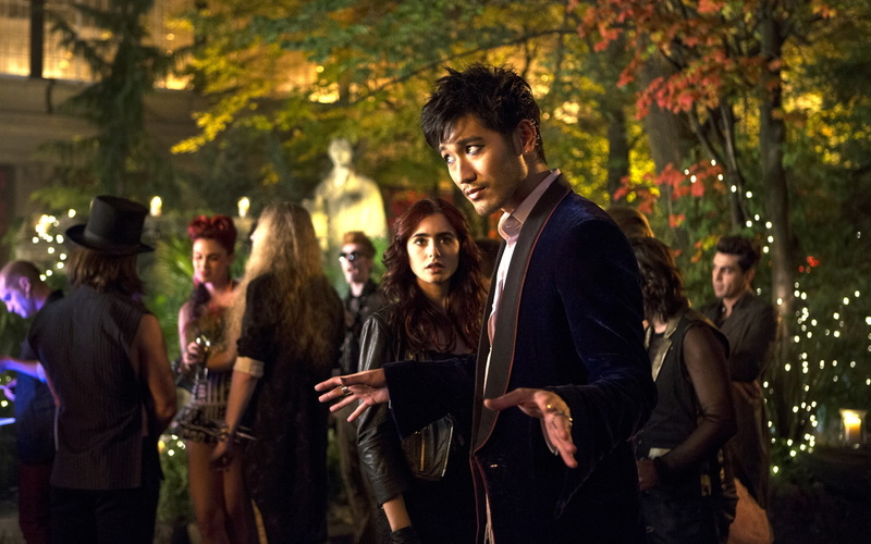 people, young adult, social gathering, movie, standing, adult, jacket, young men, night, lifestyles, group of people, glass, friendship, mortal, party - social event