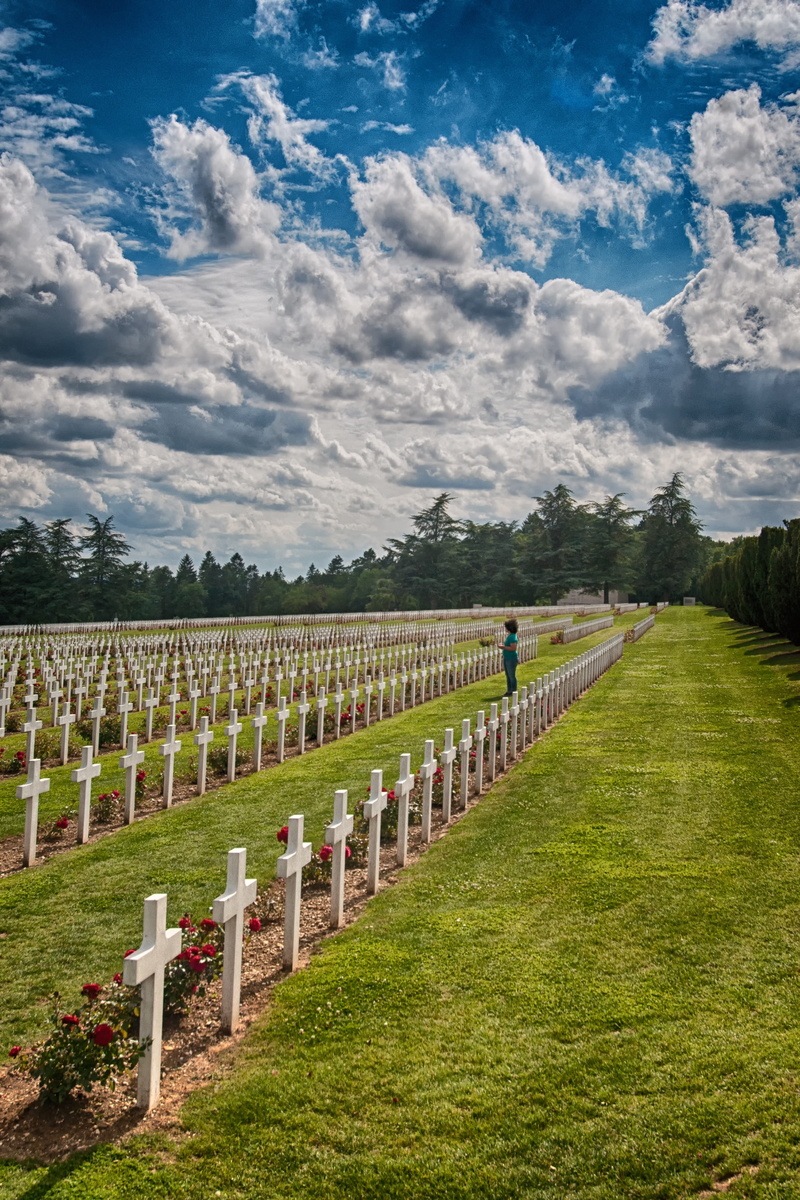 grave, in a row, day, outdoors, history, grass, cloud - sky, sadness, ossuary, memorial, green color, stone, verdun, the past, 1914, religion, memory, douaumont