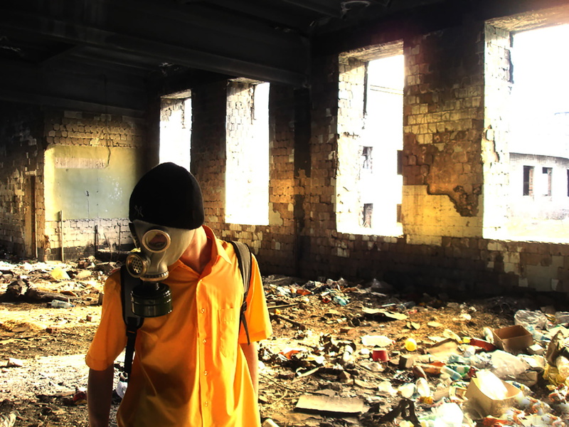 messy, three quarter length, built structure, deterioration, lifestyles, day, ruined, indoors, decline, gas masks, abandoned, one person, architecture