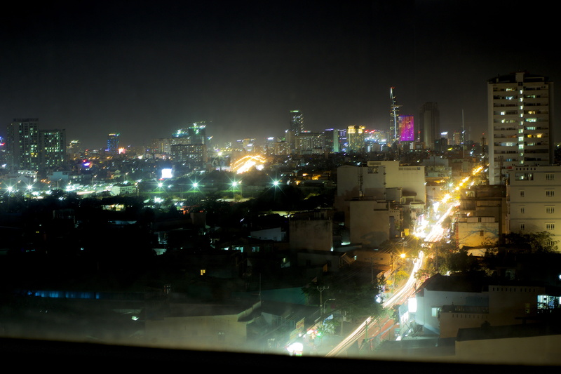 saigon, no people, illuminated, cityscape, outdoors, office building exterior, landscape, sky, south east asia, pollution, ho chi minh city, glowing, city life