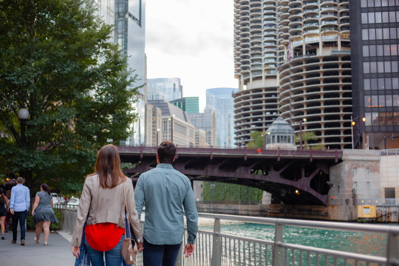 couple - relationship, togetherness, rear view, men, outdoors, city, bridge, built structure, three quarter length, women, 5K, skyscraper, chicago riverwalk