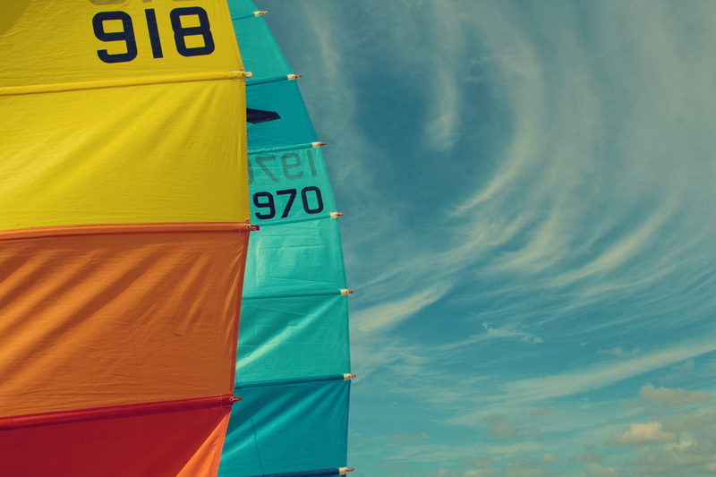 outdoors, text, sky, nature, low, beach, cloud - sky, photo, s, sail, blue, two, orange, white, activity, sport, sea, flag, green color, architecture, outdoor