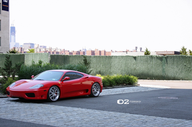 supercar, 2012, motor vehicle, building exterior, land vehicle, sky, red, mode of transportation, parking lot, no people, copy space, nature, outdoors