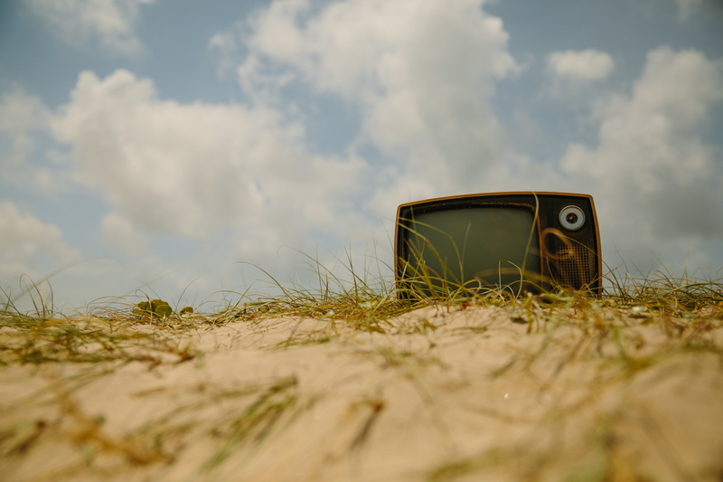 sky, plant, grass, beach, outdoors, obsolete, abandoned, clouds, television, old, oldschool, vintage, nature, tv, cloud - sky, land, field, crt, brown
