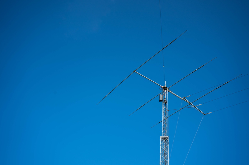 spoke, wind turbine, sky, radio, power supply, wind power, electrical device, communication, machine, outdoors, tubing, nature, environmental conservation