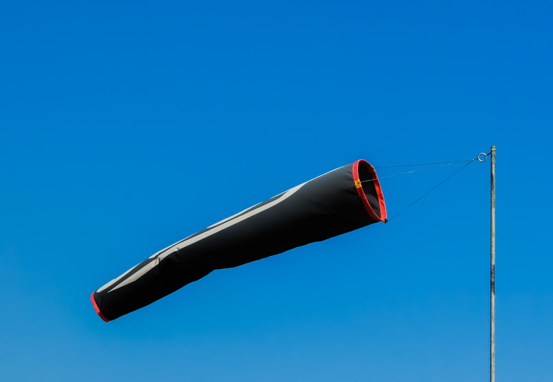 blue, copy space, directly below, red, mode of transportation, blue background, sunny, direction, flying, sky, sunlight, no people, colored background