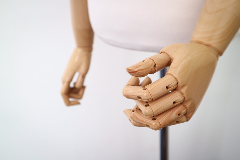 human hand, prosthetic, front view, hand, men, closeup, puppet, ring, one person, focus on foreground, photo, holding, adult, copy space, arm, statue, indoors