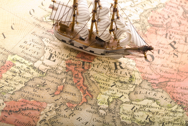 pattern, studio shot, high angle view, galleon, miniature, globe - Man Made Object, topography, travel, selective Focus, map, paper, souvenirs, indoors