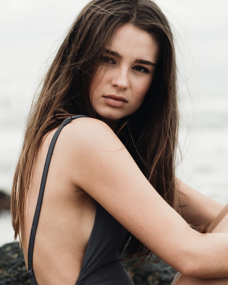 brown hair, contemplation, long hair, looking at camera, tank, sideways, adult, near, rock, wearing, black, women, young women, body, water, young adult