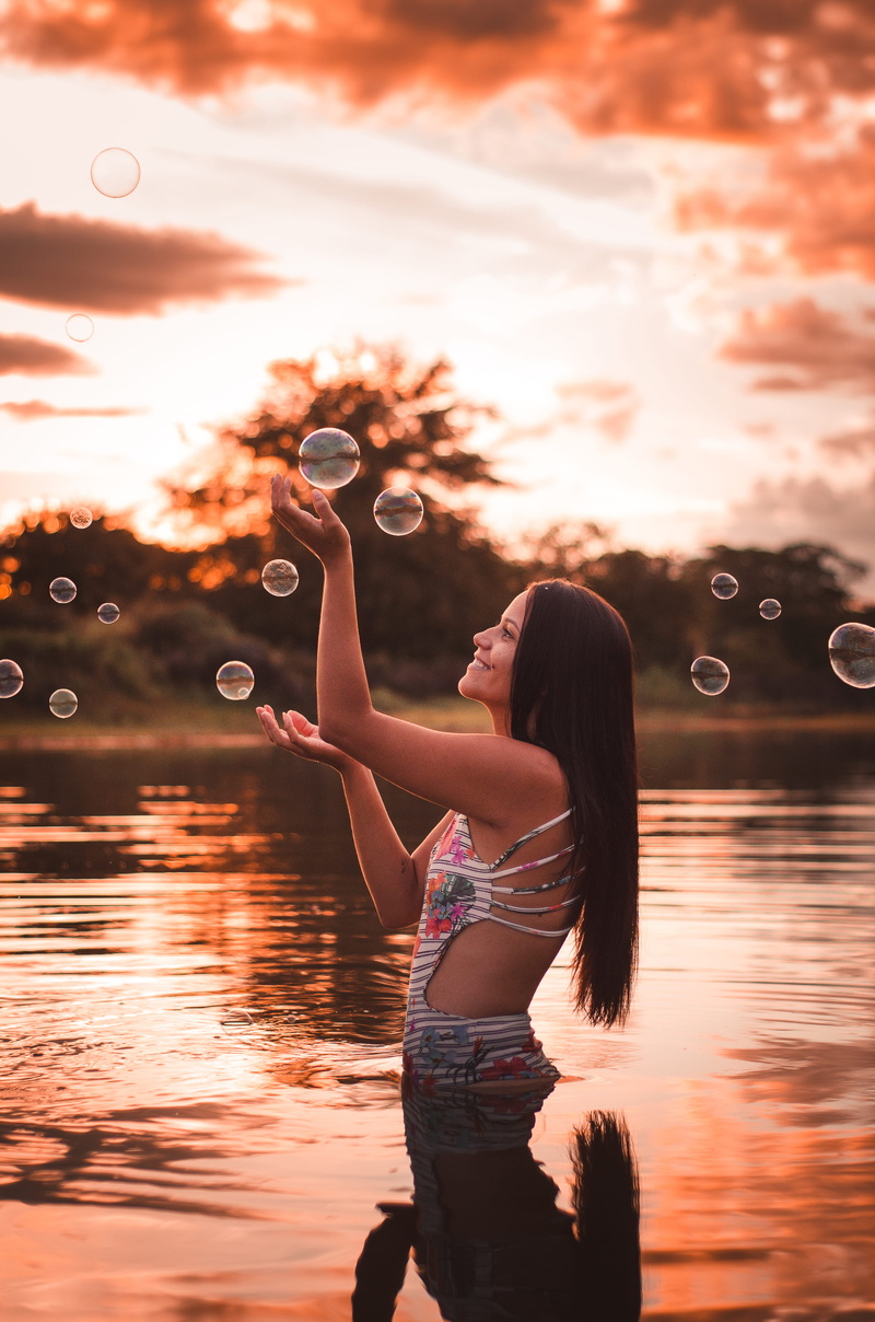 model, clouds, three quarter length, fashionable, beautiful, facial expression, youth, holding, hairstyle, pretty, fashion, nature, lady, bubble, girl