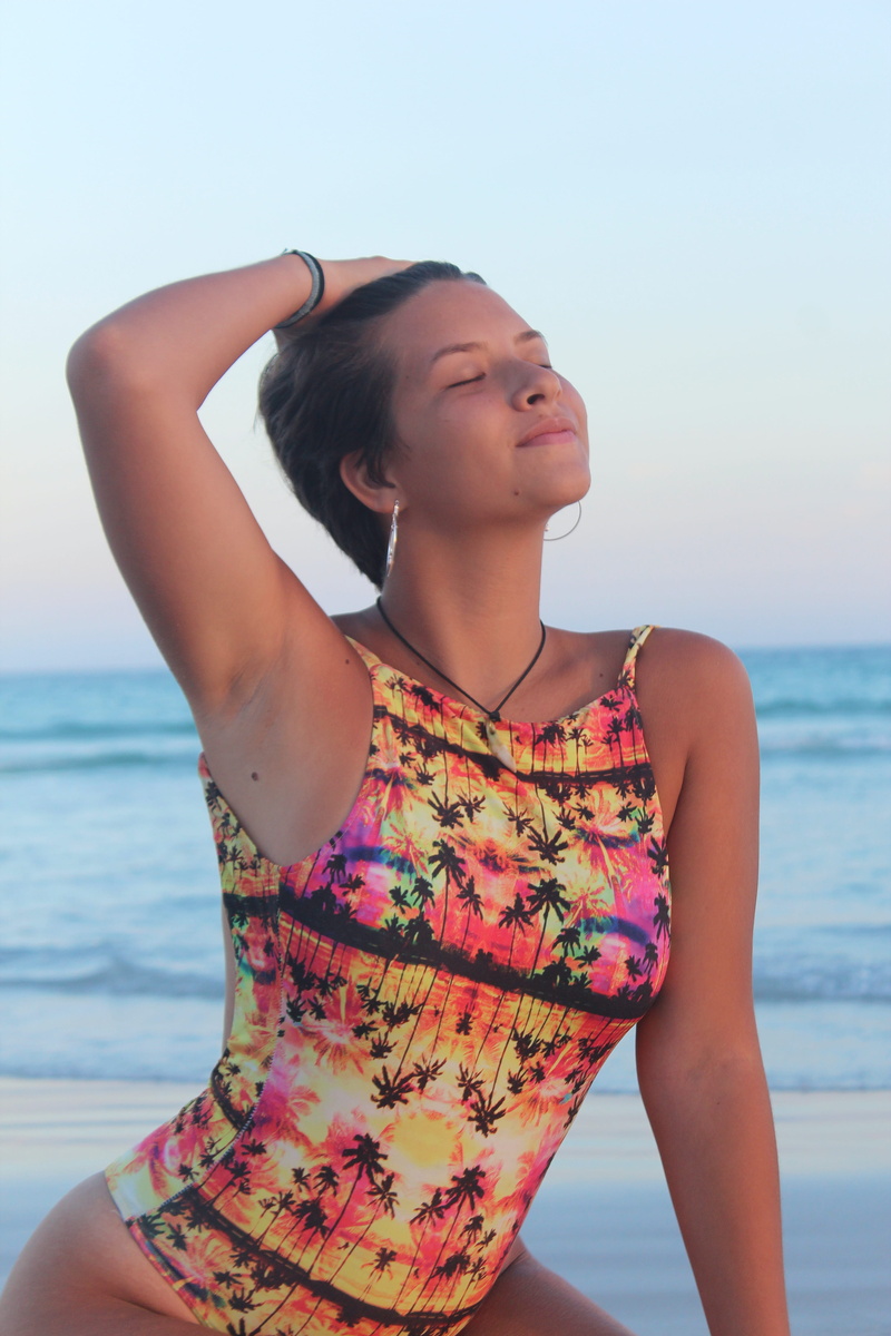 fun, woman, 5K, young adult, front view, floral pattern, land, swimsuit, sky, leisure, leisure activity, horizon over water, looking, photoshoot, sea
