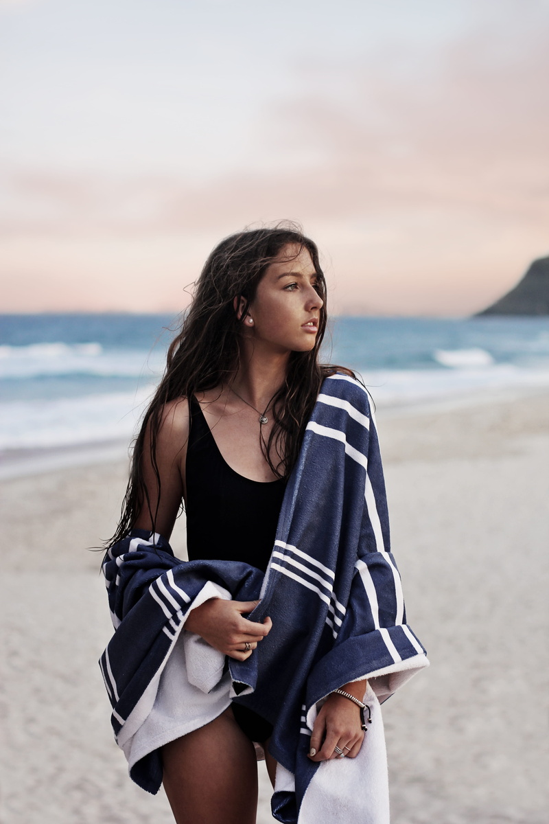 piece, towel, 5K, near, beauty, beautiful woman, water, female, standing, long hair, horizon over water, land, brunette, ocean, sea, shore, sky, swimsuit