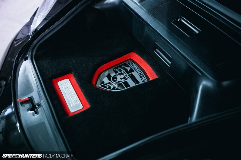 red, indoors, car interior, retro styled, telephone, Porsche Cayman, no people, transportation, Porsche, mode of transportation, metal, motor vehicle, number
