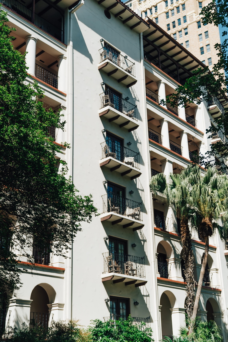 building, balcony, handrail, street, plant, curtain, banister, concrete, nature, no people, built structure, urban, high rise, architecture, apartment building