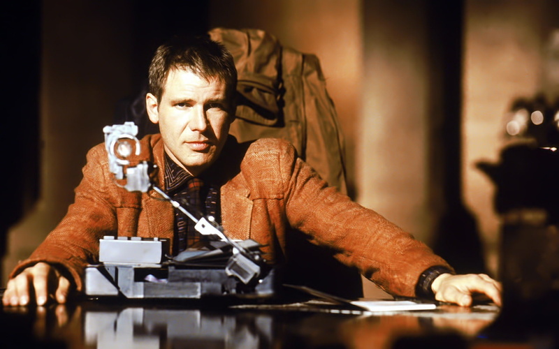 movies, table, adult, waist up, technology, males, 1080P, indoors, Harrison Ford, Bladerunner, portrait, concentration, men, young adult, looking, serious