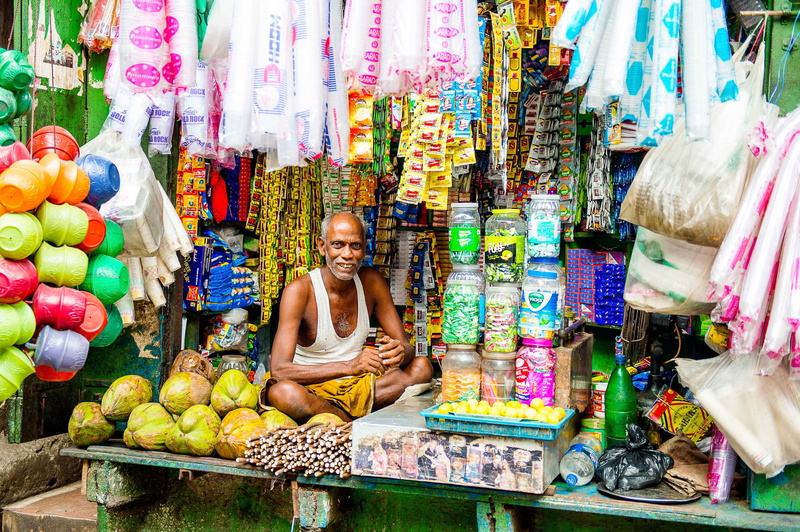 orange, one person, food, food and drink, multi colored, retail, 4K, market stall, store, business, asian, green, sale, women, selling, large group of objects