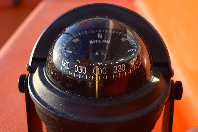 fuel and power generation, gasoline, high angle view, points of the compass, close-up, focus on foreground, single object, needle, metal, no people, navigation device