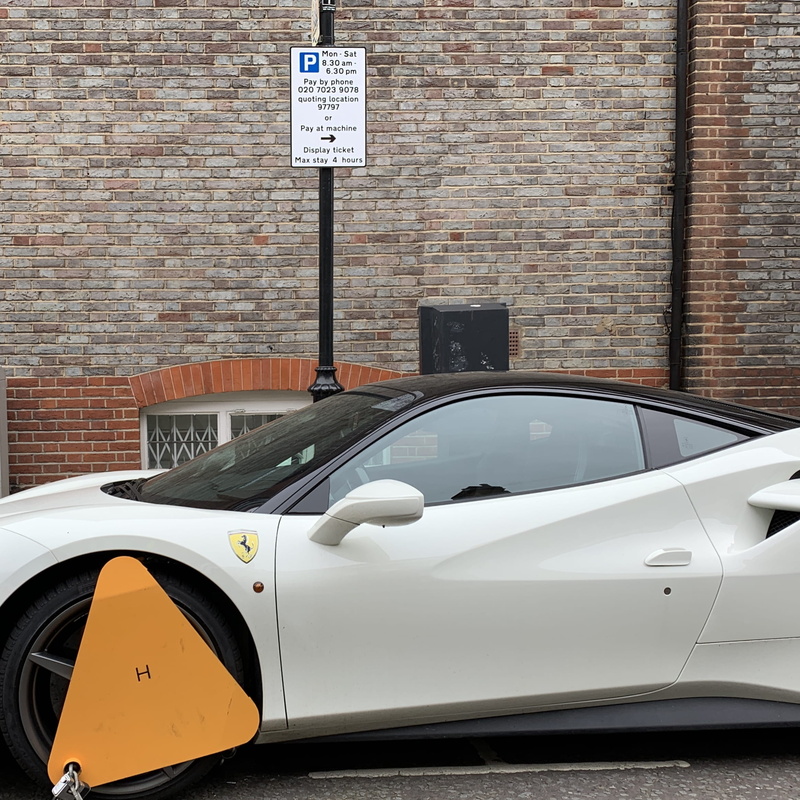 tire, united kingdom, car wheel, building exterior, 1080P, ferrari, brick wall, information, spoke, 27 mulberry walk, triangle, no people, built structure