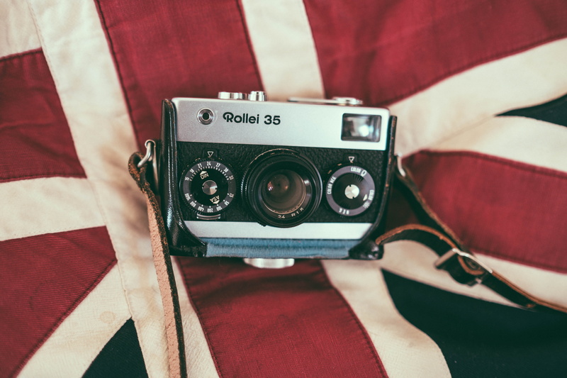 activity, flag, white, silver, cloth, camera gear, front view, mid adult, red, camera, photography themes, arts culture and entertainment, black, gear