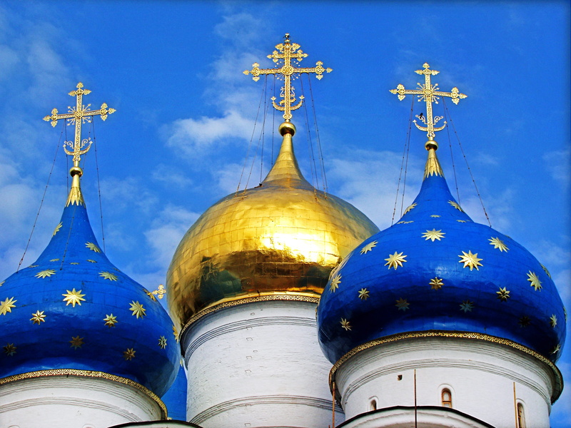 low angle view, spirituality, sergiev posad, no people, belief, building exterior, built structure, showplace, sky, cross, russia, blue, history, place of worship