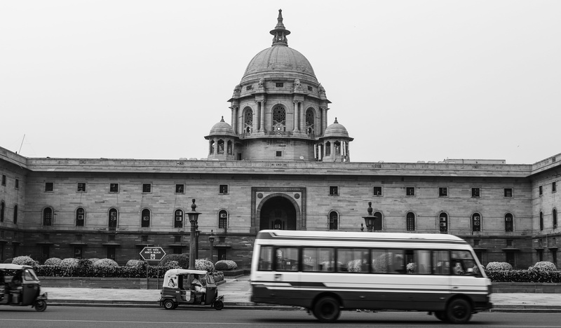 automobile, land vehicle, double decker bus, nature, the past, building, architecture, government, city, mode of transportation, grayscale, person, human