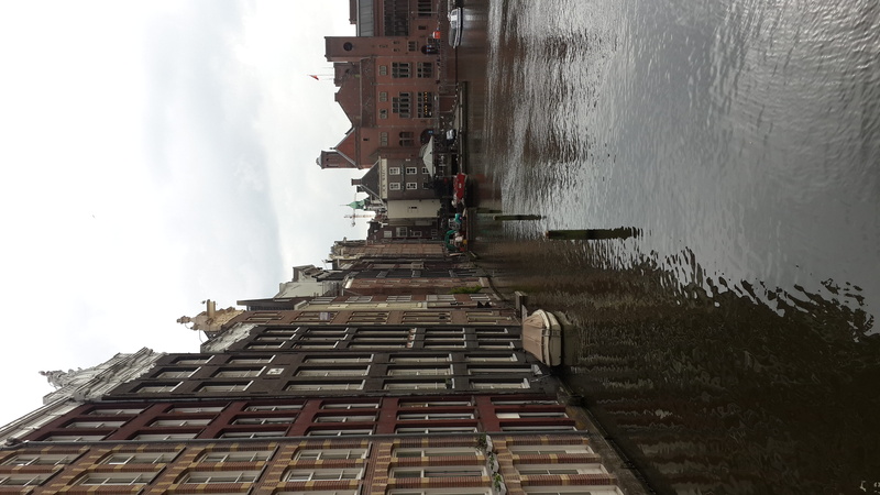 no people, reflection, building, amsterdam, ibis styles amsterdam central station, built structure, cloud - sky, day, central station, mode of transportation