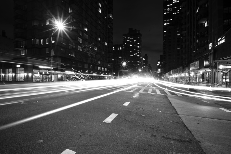 lighting equipment, cityscape, illuminated, zebra crossing, building, direction, city life, tarmac, diminishing perspective, lens flare, road, light trail