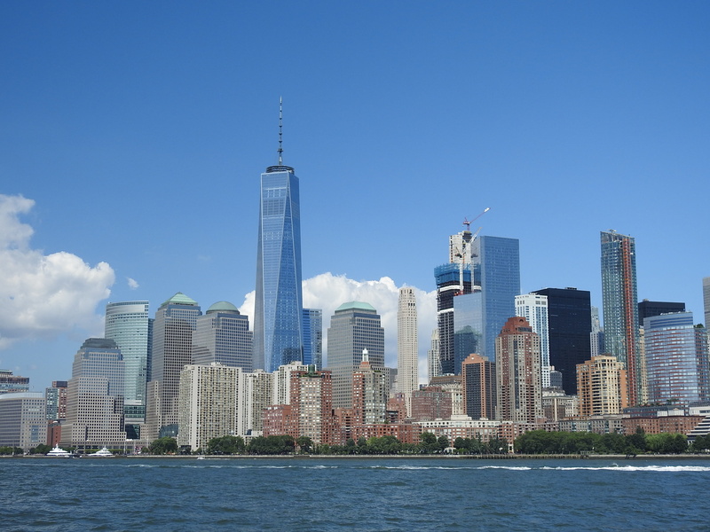 spire, building, waterfront, city, landscape, travel, office building exterior, building exterior, sky, architecture, distant, cityscape, 1 world trade center