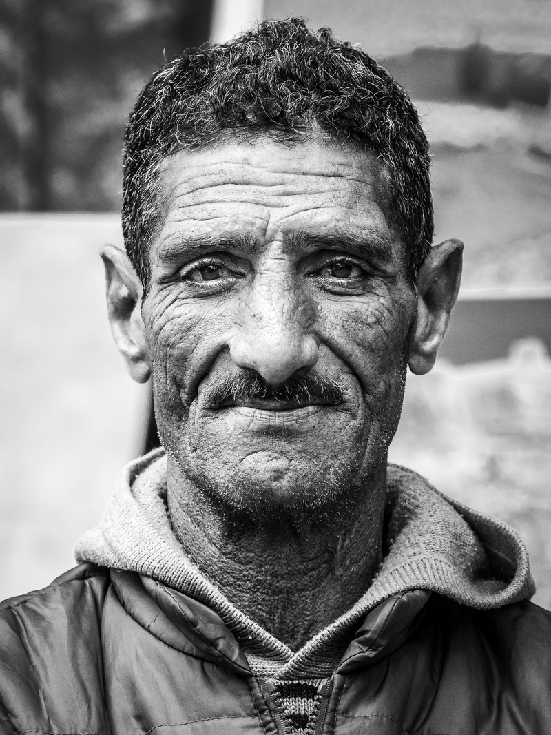 headshot, leisure activity, looking at camera, moustache, human, close-up, wrinkles, marocco, day, adult, mature adult, morocco, real people, lifestyles