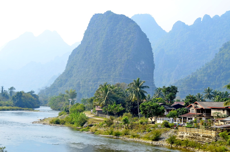 luang prabang, no people, hill, non-urban scene, outdoors, building, water, 4K, mountain range, sky, built structure, formation, day, laos, tranquil scene