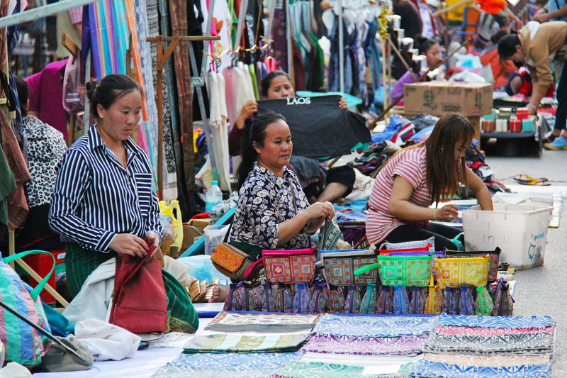 female, clothes, casual clothing, traditional, small business, 2K, shoes, girls, selling, vendor, adult, night, culture, souvenirs, happy, group of people