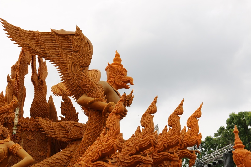 candle, architecture, built structure, sculpture, low angle view, dragon, spirituality, religion, no people, 2K, nakhon ratchasima, demon - fictional character