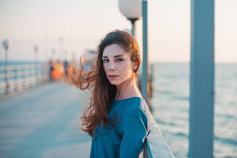 sea, contemplation, young women, pier, standing, women, water, long hair, focus on foreground, brown hair, beautiful woman, beauty, waist up, outdoors