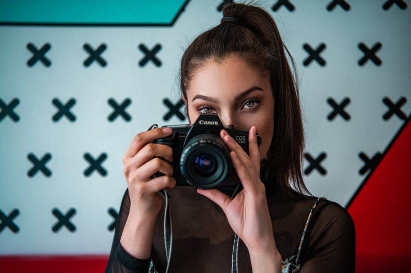mural, portrait, Canon, hands, brunette, camera, bokeh, Trevor Johnsen, indoors, looking at viewer, women indoors, ponytail, model, photography, 2K, covered face