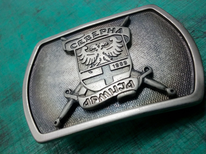 finance, vintage, colored background, belt buckle, extreme close-up, high angle view, studio shot, indoors, close-up, wealth, directly above, selective focus