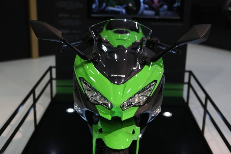 transportation, kawasaki, pattern, competition, no people, metal, architecture, table, black color, ninja, green color, helmet, day, close-up, indoors