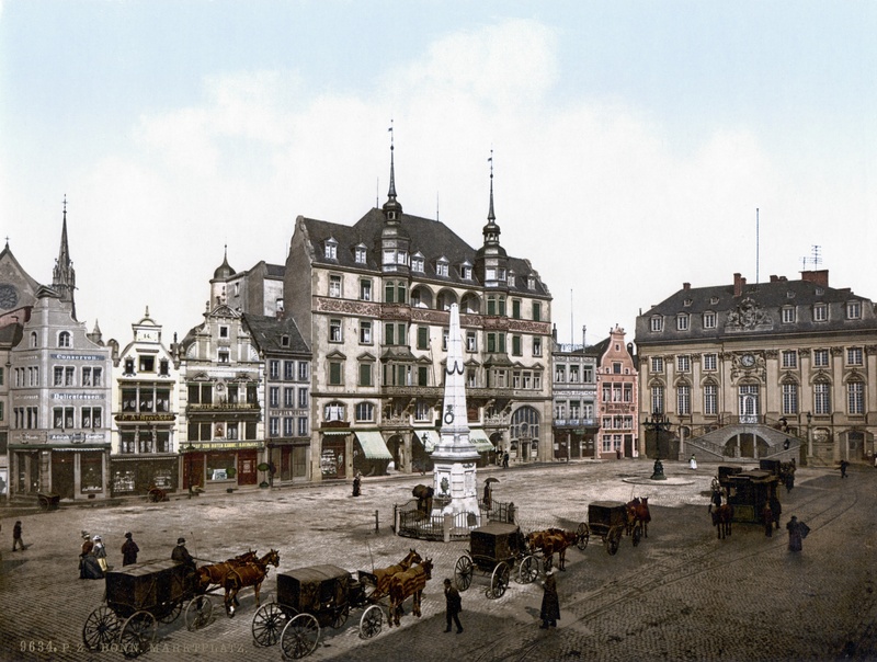 architecture, animal themes, group of animals, front, carriages, cloud - sky, mammal, marketplace, herbivorous, buildings, tourism, sky, domestic animals