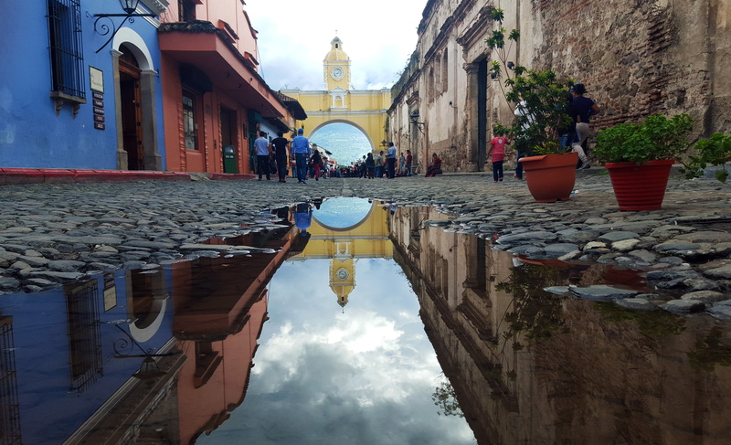 reflection, beside, outdoors, cityscape, potted, sky, tourism, residential district, flowers, town, nature, day, place of worship, old, road, europe, cultures