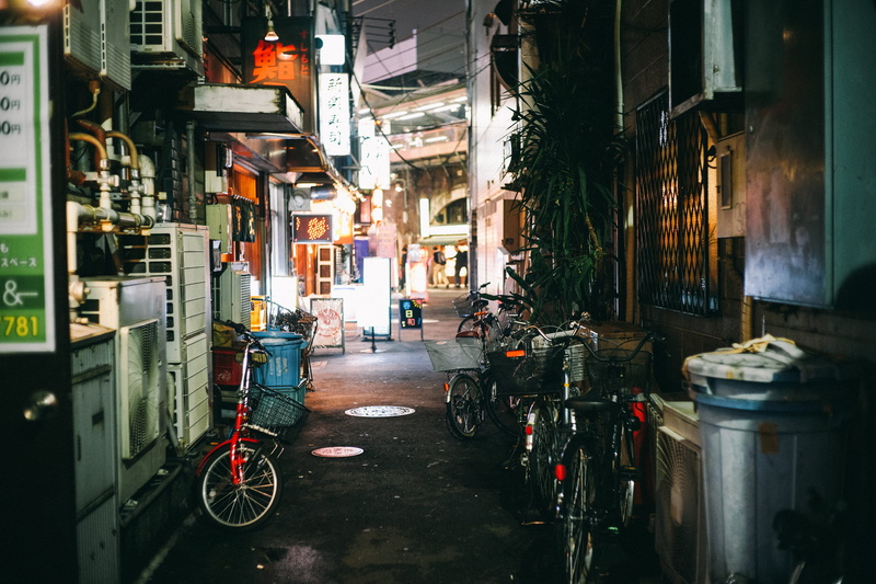 direction, alleyway, city, incidental people, bicycle, tokyo, 2K, alley, illuminated, mode of transportation, transportation, land vehicle, street, outdoors