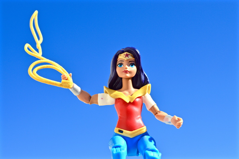 woman, action, wonder, action figure, wonder woman, holding, front view, humor, nature, three quarter length, standing, sky, figure, girl, young adult