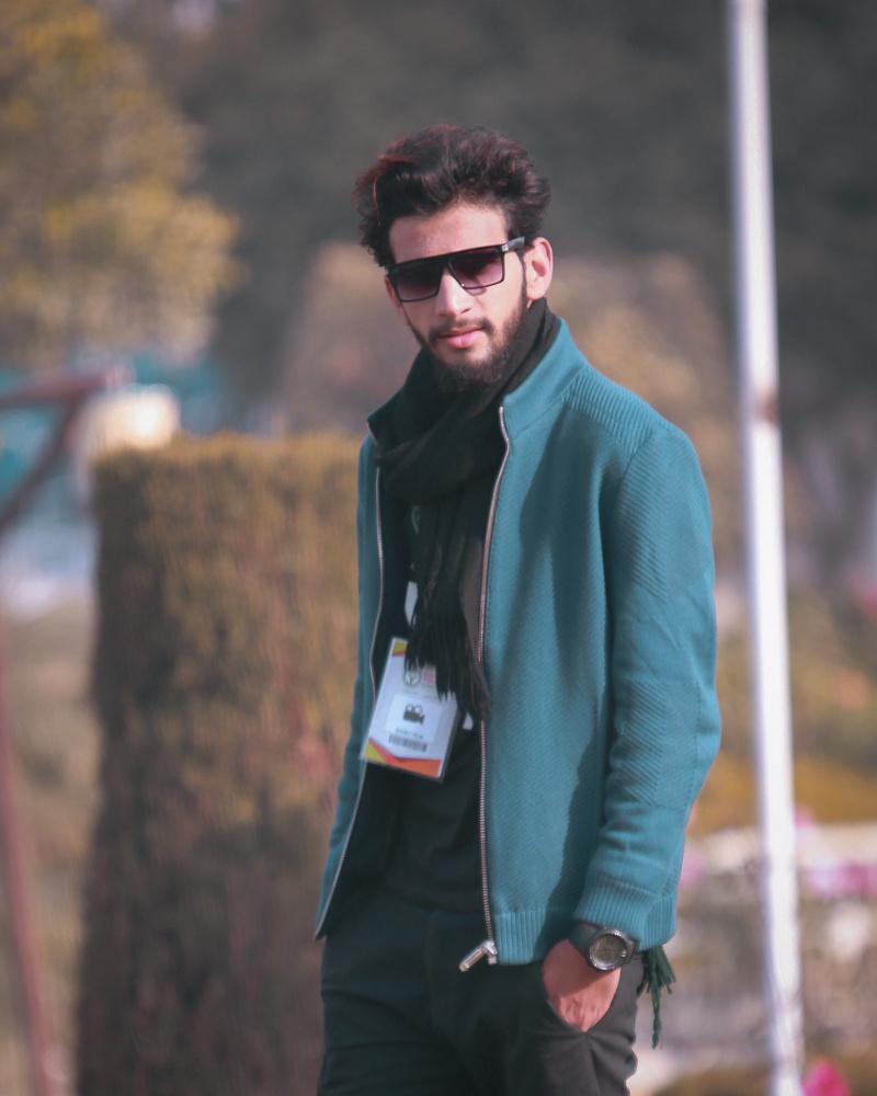 male model, three quarter length, hairstyle, adult, black, boys fashion, lifestyles, boy, young, style, front view, outdoors, casual clothing, color, standing