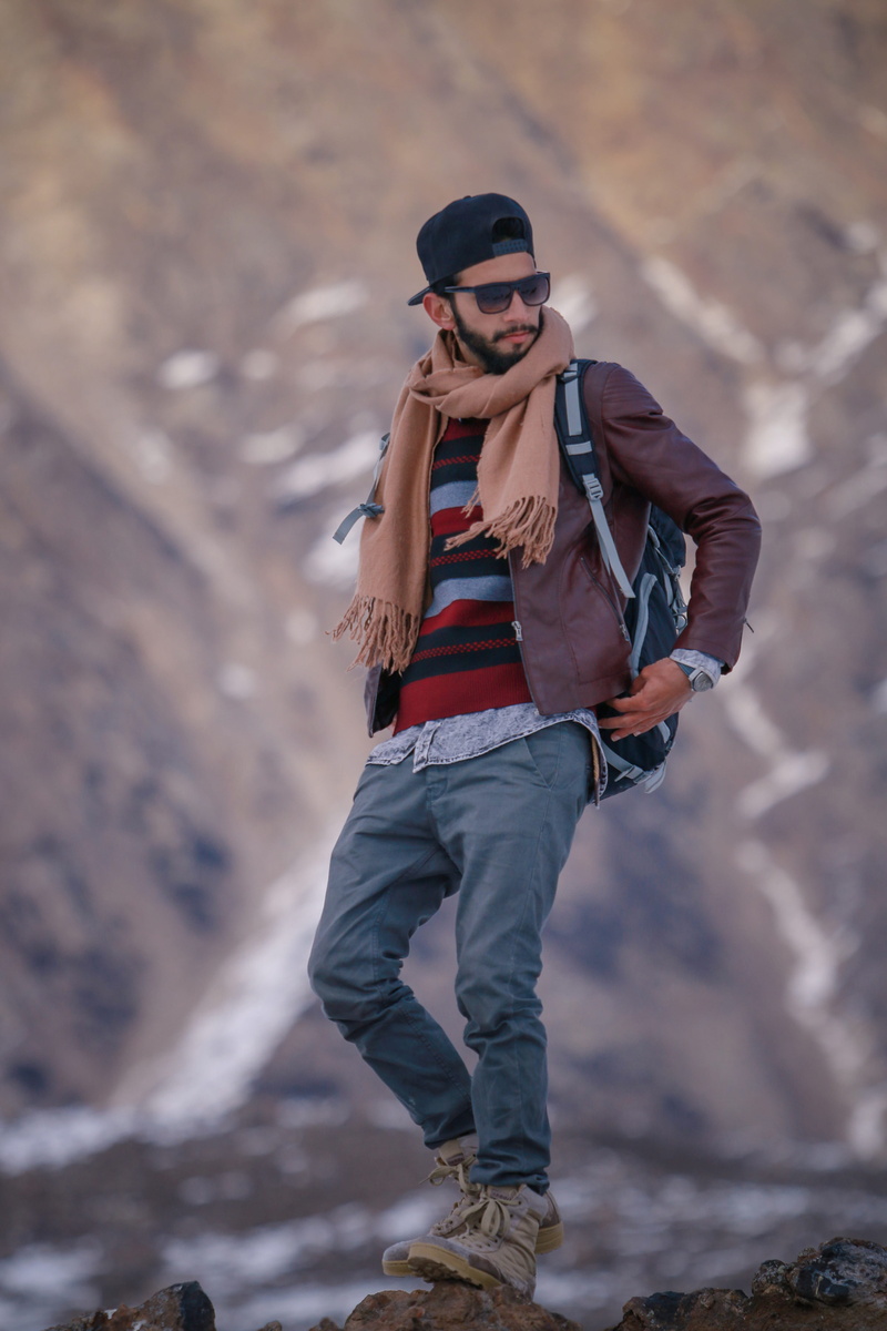 real people, fashion, young men, sunglasses, look, clothing, standing, white, outdoors, young adult, black, adult, full length, style, travel, color, rock